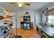 Bedroom featuring a drum set, ceiling fan and neutral colored walls and floors at 1575 Longbow Dr, Lakeland, FL 33810