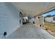 Carport featuring ample space for parking and storage at 1575 Longbow Dr, Lakeland, FL 33810