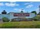 Fox Wood Lake Estates entrance sign in a deed-restricted senior community at 1575 Longbow Dr, Lakeland, FL 33810