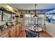 Bright dining area with natural light, built-in cabinets, and space for casual dining at 1575 Longbow Dr, Lakeland, FL 33810