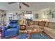 Cozy living room featuring comfortable seating and ample wall decorations for a personalized touch at 1575 Longbow Dr, Lakeland, FL 33810