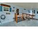Welcoming covered porch featuring outdoor seating and ramp for easy access at 1575 Longbow Dr, Lakeland, FL 33810