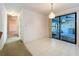 Bright dining area with sliding glass door access to the cozy lanai space at 1600 Alma Ct, Bartow, FL 33830