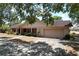 Attractive single-Gathering home with a front-facing two car garage, driveway, and beautiful yard at 1600 Alma Ct, Bartow, FL 33830