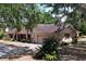 Inviting single-story home with lush landscaping, attached garage and charming curb appeal at 1600 Alma Ct, Bartow, FL 33830