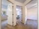 Hallway with view into three bedrooms at 1600 Alma Ct, Bartow, FL 33830