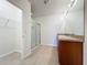 Bathroom featuring double sink vanity, walk-in shower, and tile flooring at 1835 Jackson Oaks Dr, Bartow, FL 33830