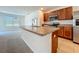 Spacious kitchen features an island and stainless steel appliances at 1835 Jackson Oaks Dr, Bartow, FL 33830