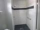 Newly renovated shower with a sleek design and subway tile at 1835 Mount Pisgah Rd, Fort Meade, FL 33841