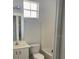 Clean bathroom features a single vanity, a toilet, and a tub-shower combination at 184 Ocean Bluff Dr, Poinciana, FL 34759