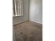 Comfortable bedroom with neutral carpet and a window offering natural light at 184 Ocean Bluff Dr, Poinciana, FL 34759