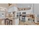Well-equipped kitchen featuring stainless steel appliances and a breakfast bar with seating at 1850 Saddlewood Pl, Bartow, FL 33830