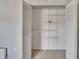 Spacious closet with ample shelving and bi-fold doors at 1920 E Edgewood Dr # D7, Lakeland, FL 33803
