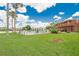 Community pool with lounge chairs, well-maintained lawn and easy access to other amenities at 1920 E Edgewood Dr # D7, Lakeland, FL 33803