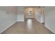 Spacious living area with neutral tile flooring, ready for customization and comfortable living at 1920 E Edgewood Dr # D7, Lakeland, FL 33803
