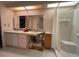 Functional bathroom with dual sinks, shower, and ample under-sink storage at 2055 S Floral Ave # 262, Bartow, FL 33830