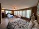 Inviting bedroom with two beds and large windows for natural light at 2055 S Floral Ave # 262, Bartow, FL 33830