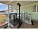 Welcoming home entrance with a ramp providing accessibility to the front door at 2055 S Floral Ave # 262, Bartow, FL 33830