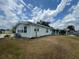 Single-story home with a covered carport and mature landscaping near the water at 2055 S Floral Ave # 262, Bartow, FL 33830