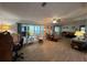 Inviting living room with ample seating, natural light and a ceiling fan at 2055 S Floral Ave # 262, Bartow, FL 33830