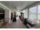 Cluttered sunroom with view, showcasing potential for relaxation and enjoyment at 2055 S Floral Ave # 262, Bartow, FL 33830