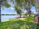 The backyard has a walkway to the lake and stunning views that surround the beautiful property at 2055 S Floral Ave # 291, Bartow, FL 33830