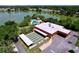 Aerial view of community amenities including a pool, shuffleboard and clubhouse, offering a vibrant lifestyle at 2055 S Floral Ave # 291, Bartow, FL 33830