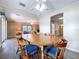 Comfortable dining area with views of the living room and kitchen, perfect for entertaining at 2055 S Floral Ave # 291, Bartow, FL 33830