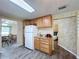 Efficient kitchen layout with ample cabinet space and an easy access to the dining area at 2055 S Floral Ave # 291, Bartow, FL 33830