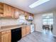 This kitchen features an efficient layout with a range of appliances and seamless access to dining at 2055 S Floral Ave # 291, Bartow, FL 33830