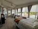 Bright and airy bedroom with tile flooring and large windows at 2055 S Floral Ave # 45, Bartow, FL 33830