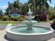 Beautiful fountain at the entrance of Floral Lakes community, creating an inviting atmosphere at 2055 S Floral Ave # 45, Bartow, FL 33830