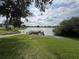 Beautiful lake view with a private dock, offering serene waterfront living at 2055 S Floral Ave # 45, Bartow, FL 33830