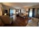 Spacious living room featuring hardwood floors and comfortable seating arrangements at 2055 S Floral Ave # 45, Bartow, FL 33830