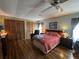 Cozy main bedroom with ample closet space and ensuite bathroom access at 2055 S Floral Ave # 45, Bartow, FL 33830