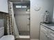 This bathroom has a glass enclosed shower with decorative tile and updated fixtures at 2055 S Floral Ave # 69, Bartow, FL 33830
