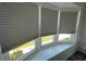 Bright bay window with scenic views of the lush greenery outside, perfect for enjoying natural light at 2055 S Floral Ave # 69, Bartow, FL 33830