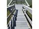Dock stairway leads to the lake with easy access for outdoor activities at 2055 S Floral Ave # 69, Bartow, FL 33830