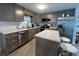 Well-equipped kitchen with stainless steel appliances, ample counter space, and an island with seating at 2055 S Floral Ave # 69, Bartow, FL 33830
