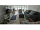 Cozy living room featuring comfortable seating, stylish decor, and plenty of natural light at 2055 S Floral Ave # 69, Bartow, FL 33830