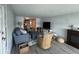 Inviting living room featuring cozy seating, modern decor, and seamless access to other living spaces at 2055 S Floral Ave # 69, Bartow, FL 33830