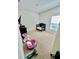 Bedroom with neutral carpet, crib, and toddler toys at 264 Fiddlewood Ct, Davenport, FL 33837