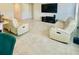 View of a living room featuring comfortable seating and entertainment center at 264 Fiddlewood Ct, Davenport, FL 33837