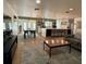 Open-concept living room and kitchen with a dining area and modern appliances at 2742 Pine Acres Dr, Lake Wales, FL 33898