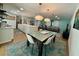 Bright living room featuring a dining area, modern furniture, and neutral colors at 2742 Pine Acres Dr, Lake Wales, FL 33898
