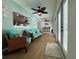 Comfortable sunroom with stylish furnishings and serene decor, perfect for relaxing and enjoying natural light at 2742 Pine Acres Dr, Lake Wales, FL 33898