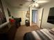 Bedroom featuring a television, dresser, closet and ceiling fan at 294 Winter Ridge Blvd # 294, Winter Haven, FL 33881