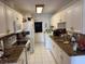 Functional kitchen featuring white cabinetry, granite countertops, and essential appliances for everyday cooking at 294 Winter Ridge Blvd # 294, Winter Haven, FL 33881