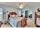 Cozy bedroom featuring a ceiling fan and sliding glass doors to the living area at 3154 Prairie Dunes W Cir, Lakeland, FL 33810