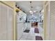 Bright kitchen featuring white cabinetry, countertops, and appliances at 3154 Prairie Dunes W Cir, Lakeland, FL 33810